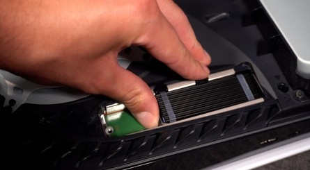 (Clockwise from top left) Fit the spacer and then insert the SSD into the slot as shown, making sure the contacts on the SSD line up with the contacts inside the slot. Push down to lock the SSD into place, refit the screw you removed earlier, and installation is complete!