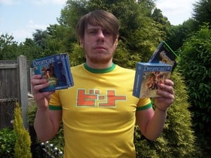 Me standing awkwardly with my original copies of Shenmue