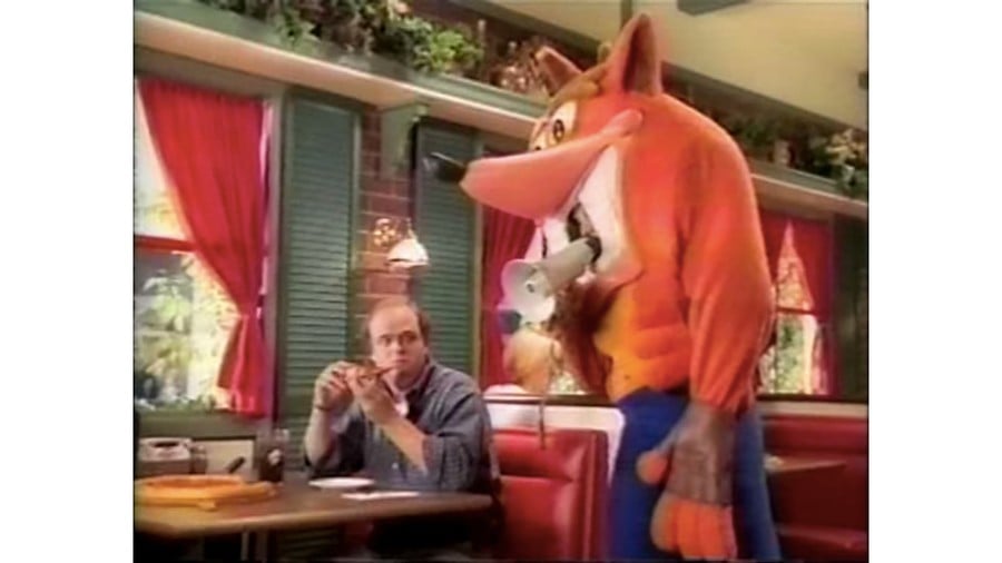 Crash partnered with Pizza Hut for a cross-promotion back in the 90s. How did he want people to eat the pizza?
