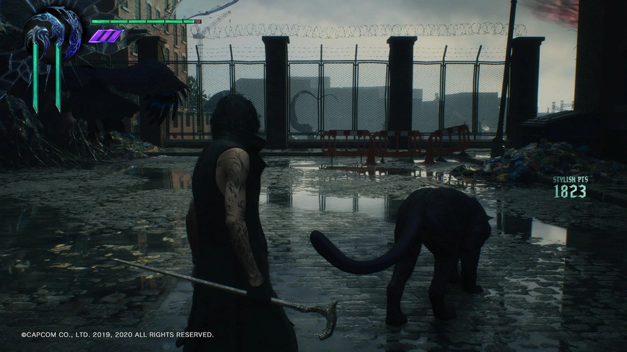 Raytracing allows for much more realistic reflections than ever before, like in this Devil May Cry 5: Special Edition screenshot where the puddles mirror the surrounding environment authentically.