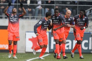Olympique Lyon: Kitted Out In Heavy Rain Shirts.
